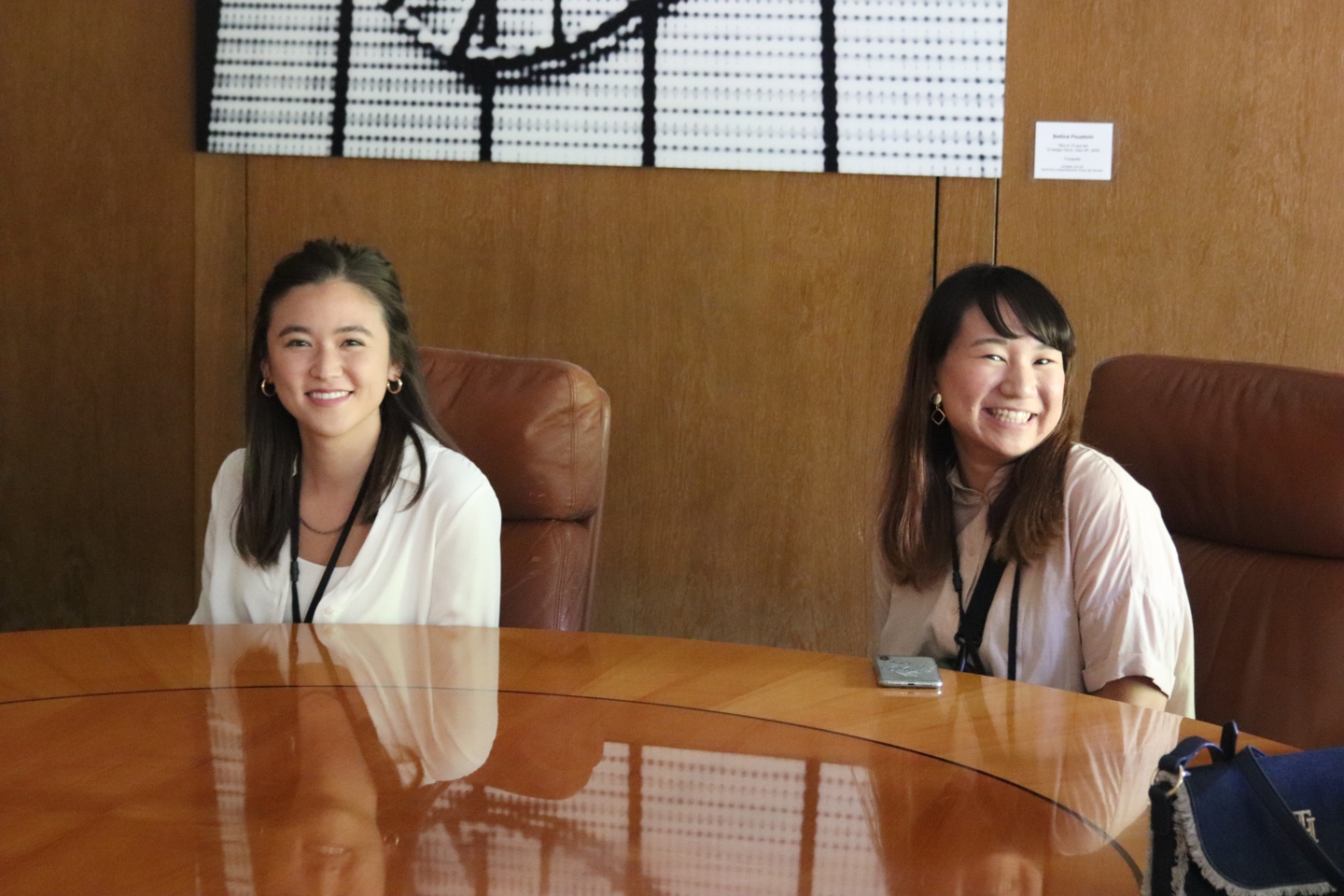 Two students sitting at a table.