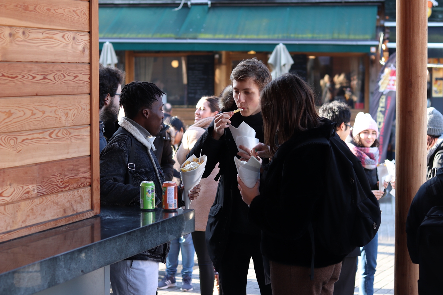 Students eating fries in Brussels